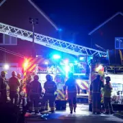 Child dies in Ashford house fire as second youngster hospitalised