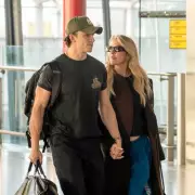 Ellie Goulding and Beau Minniear's loved-up airport display after pregnancy reveal