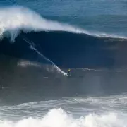 Ex-Love Island Star Laura Crane Rides 30mph Wave in World Record Bid at Nazaré