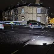 Huddersfield Drive-By Shooting: Man Suffers Life-Changing Injuries, Suspect at Large