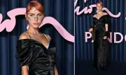 Iris Law Stuns With Auburn Hair Transformation at Fashion Awards 2025