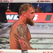 Jake Paul's Broken Jaw & Darts Star's Knockout Threat: The Unlikely Boxing Feud