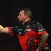 Jonny Clayton advances as Dom Taylor disqualified from World Darts Championship
