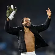 Leeds United's Calvert-Lewin Sparks England Debate as Ampadu Praises Fans