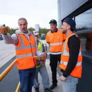 Paddy McGuinness & Sam Thompson Drive Electric HGV for Wigan Charity