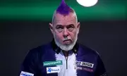 Peter Wright's World Darts Championship Dream Ends in Shock 3-0 Defeat to Arno Merk