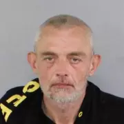 Police hunt John Argento after suspected antisemitic car firebombing in Melbourne