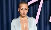 Rita Ora Stuns in Silver Gown at Fashion Awards 2024, Reveals Witchcraft Beliefs