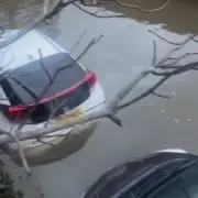 Seven Cars Submerged by Thames High Tide After Pub Parking