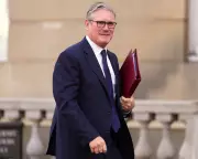 Starmer's 'Red Tape' Pledge Sparks Debate Over Public vs Market Priorities