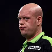Van Gerwen Tells Wright to Retire After Dismal World Darts Championship Exit