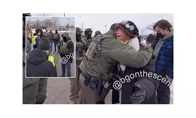 Veterans Share Heartfelt Hug Amid Minneapolis ICE Protest Unrest