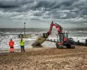 24 Shipping Containers Wash Up on Sussex Coast, Littering Beaches with Onions and Debris