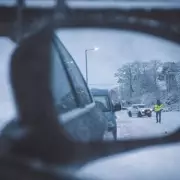 AA's Winter Driving Tip: Why an Old Rug Could Save You in the Snow