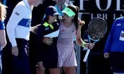 Australian Open: Zeynep Sonmez halts match to aid fainting ball kid in 29°C heat