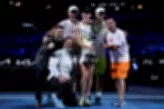 Coach Stefano Vukov Receives Trophy After Rybakina's Australian Open Win