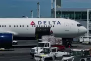 Delta Crew Used Beverage Cart to Block Unruly Passenger, Court Filing Details