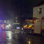 Derelict Rochdale Pub Engulfed in Flames, Emergency Services Search for Casualties