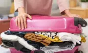 Expert Packer Reveals How to Fit Two Weeks of Clothes in Carry-On Luggage