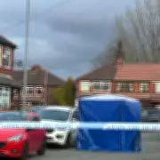 Forensic Investigation Underway After Gang Attack on Manchester Suburban Street