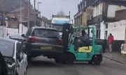 Forklift driver moves parked SUV blocking delivery in Birmingham