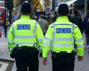 Home Secretary Backs Major Police Force Cuts and National Targets