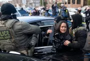 ICE Agents Drag Disabled Woman from Car in Minneapolis Amid Protests