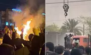 Iranian Prison Guards Accused of Executing Protesters, Covering Up Deaths