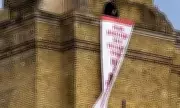 Iranian Protester Scales King's Cross Clock Tower in London to Demand Action from PM Starmer