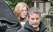 Jennifer Aniston Supports Hypnotist Boyfriend Jim Curtis at Book Event