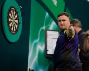 Littler's Dream Run Ends in Thrilling PDC World Darts Semi-Final