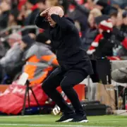 Liverpool's Substitution Chaos: Slot and Alisson Fume as Delay Proves Costly