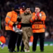 Manchester City's Champions League Match Halted by Pitch Invaders at Etihad