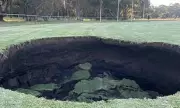 Massive Sinkhole Opens at Melbourne Park, Linked to £20bn Tunnel Project