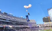 Parachutist Plunges 40 Feet Into Crowd After Tangling in Field Goal Netting at Armed Forces Bowl