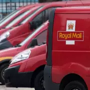Postwoman Punched in Stomach During Parcel Theft in Derbyshire