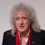 Queen's Brian May Mourns 'Indomitable' Web Manager Jen Tunney