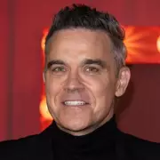 Robbie Williams Reveals Daughter's Brutal Nickname and Family Future Plans