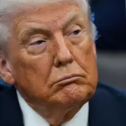 Trump Threatens to Revive Insurrection Act in Minnesota ICE Dispute