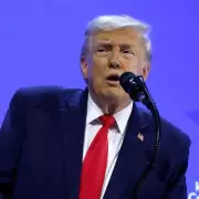 Trump's Davos Outburst: Demands Greenland Return, Threatens Military Force