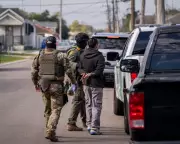 US Immigration Crackdown Pivots: 200 Officers Leave Louisiana for Minneapolis