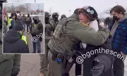 Veterans Share Heartfelt Hug Amid Minneapolis ICE Protest Unrest