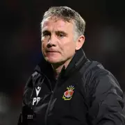 Wrexham's Transfer Deadline Drama: Record Bid, Legend's Future & Play-Off Push
