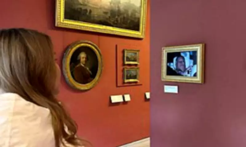 Activists Display Andrew's Arrest Photo in Louvre Museum in Paris Protest