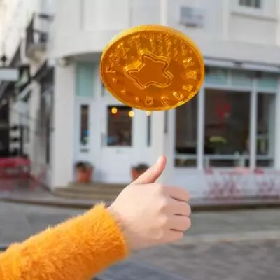 Brits Use Coin Tosses to Settle Daily Disputes from Chores to Takeaways