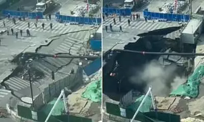 Shanghai Sinkhole Swallows Road at Construction Site, Workers Flee for Safety