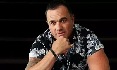 Shannon Noll Debuts Buzz Cut at Newcastle Jets Football Match Performance