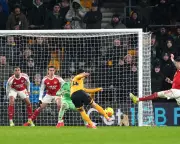 Arsenal's Title Hopes Dented by Dramatic Wolves Equaliser in Injury Time