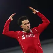 Curtis Jones Commits to Liverpool's Cause as Szoboszlai Rejects Gerrard Comparisons