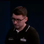 Darts Referee Owen Binks Moved to Tears in Farewell Match, Consoled by Player